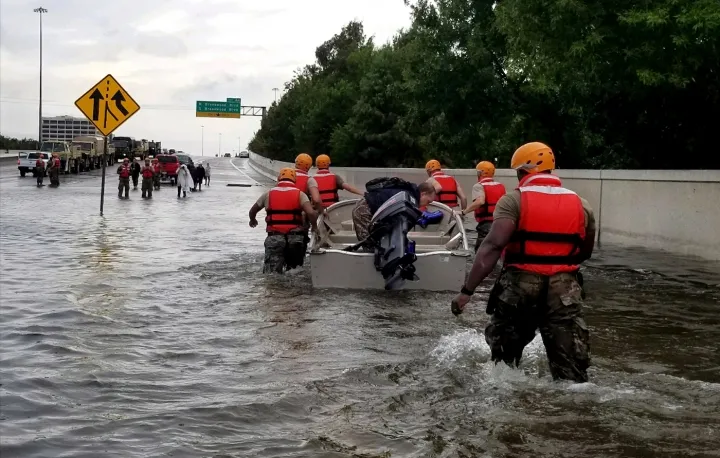 Flood-response crews moving through high water after Hurricane Harvey