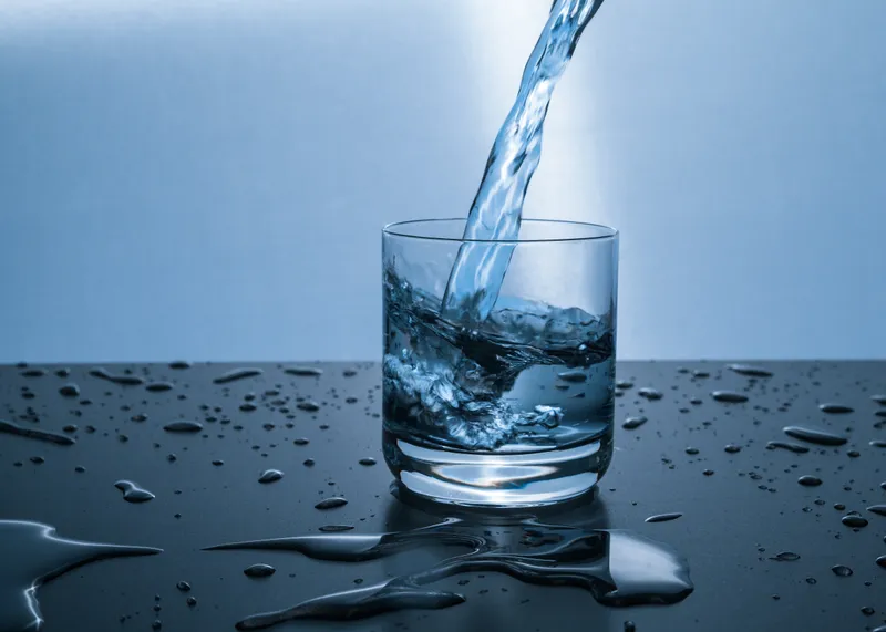 Clean water being poured into a glass